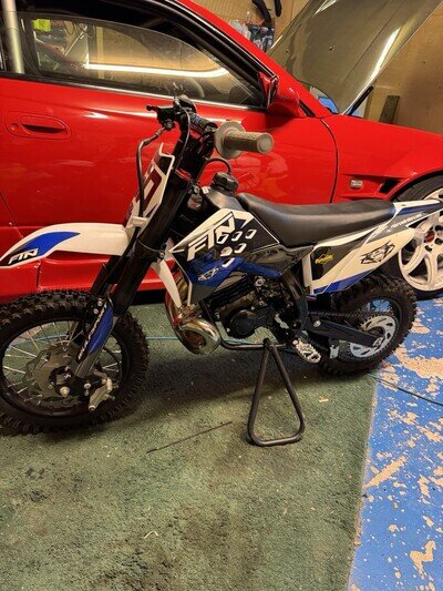 49cc 2-Stroke Kids Dirt Bike Gas-Powered Motocross, Off-Road Mini Motorcycle 49cc 2-Stroke Kids Dirt Bike Gas-Powered Motocross, Off-Road Mini Motorcycle